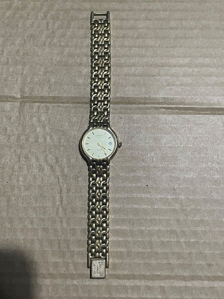 Rotary ladies quartz watch with date window with gold coloured s