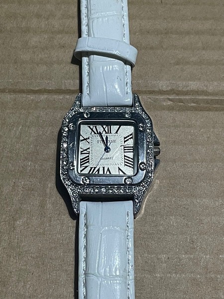 Finesse ladies quartz watch bejewelled housing with leather stra